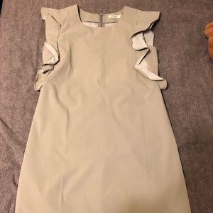 Sleeveless dress with ruffle detail